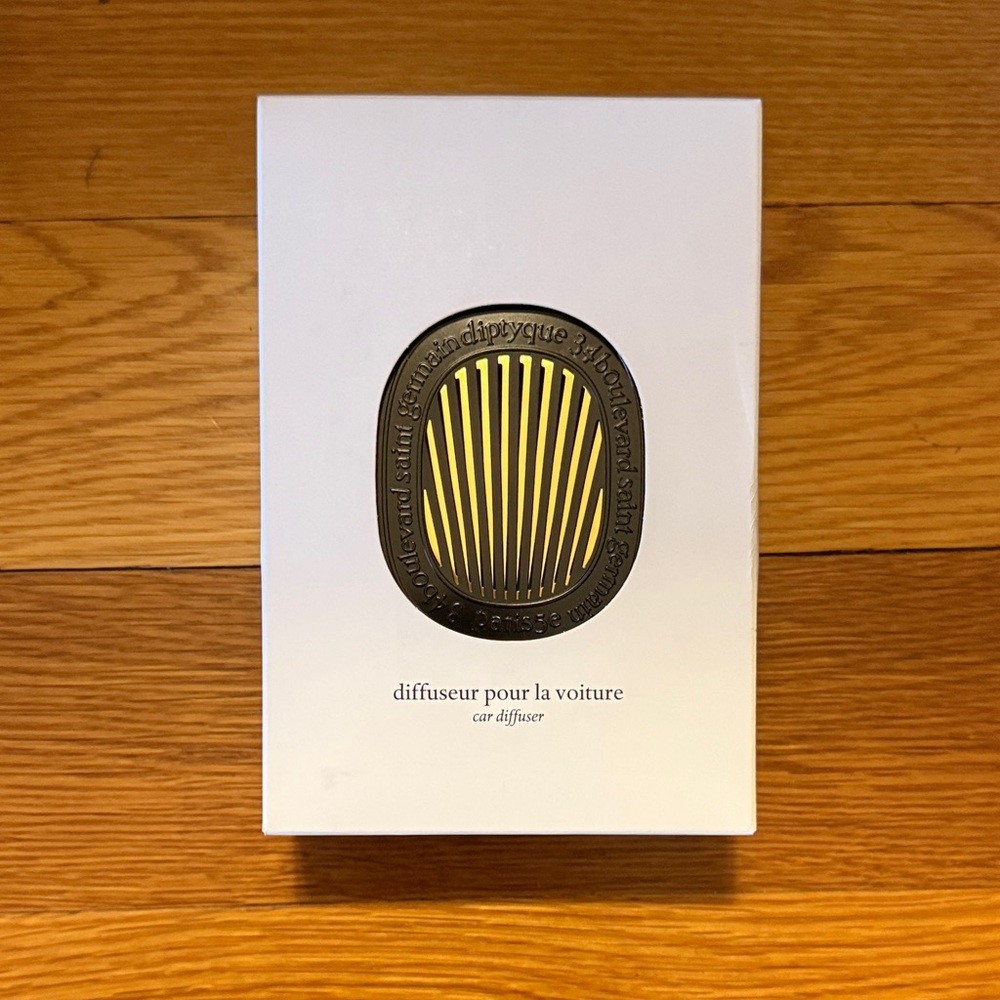 Diptyque Car Diffuser with Black and Gold Design